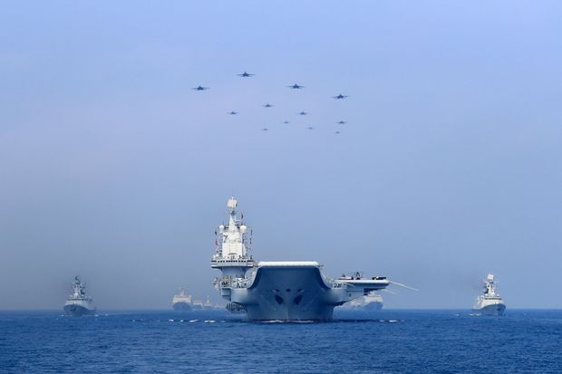 What Triggered Recent Chinese Naval Exercises in the South China Sea?
